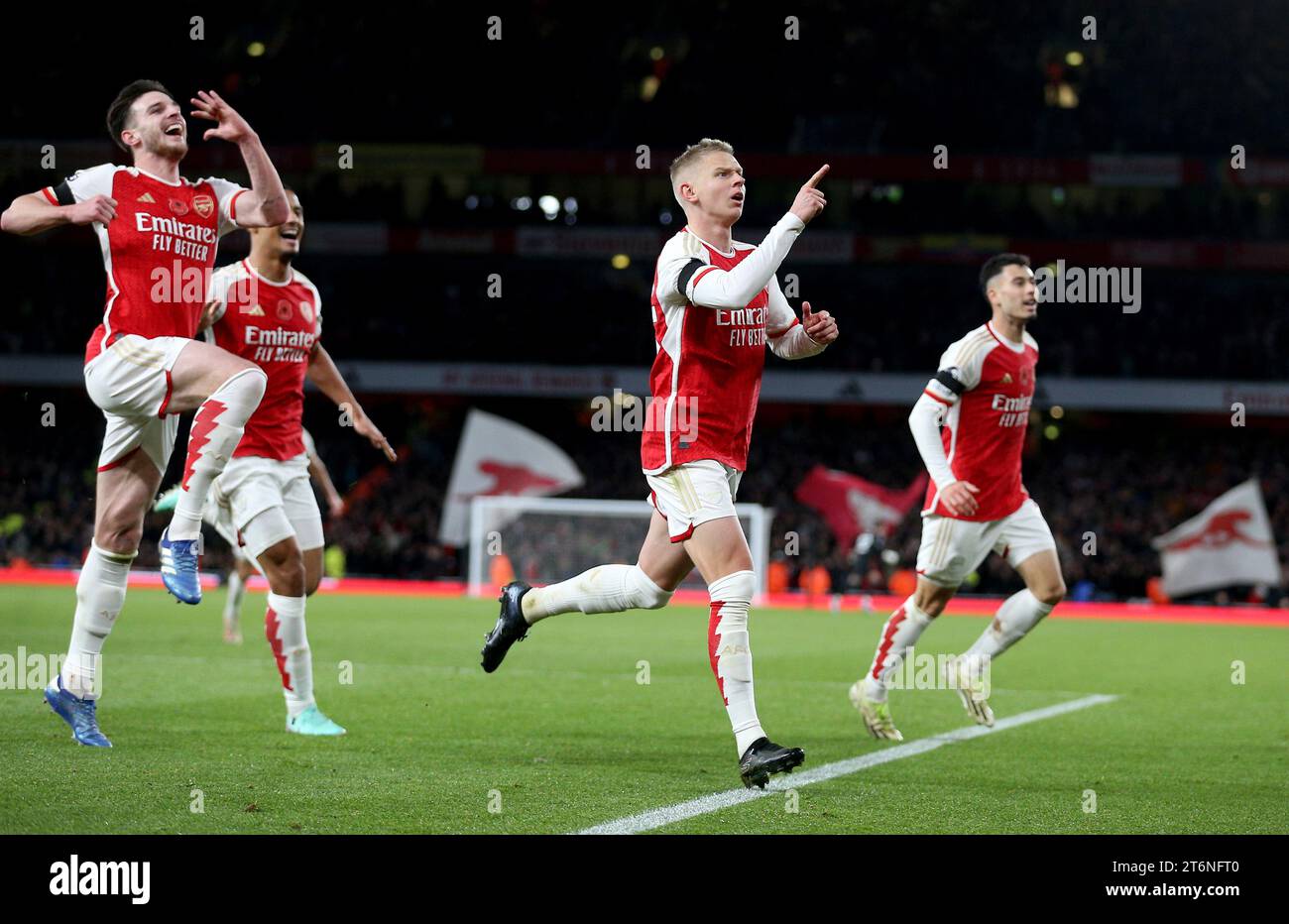 Arsenal's Oleksandr Zinchenko (second right) celebrates scoring his