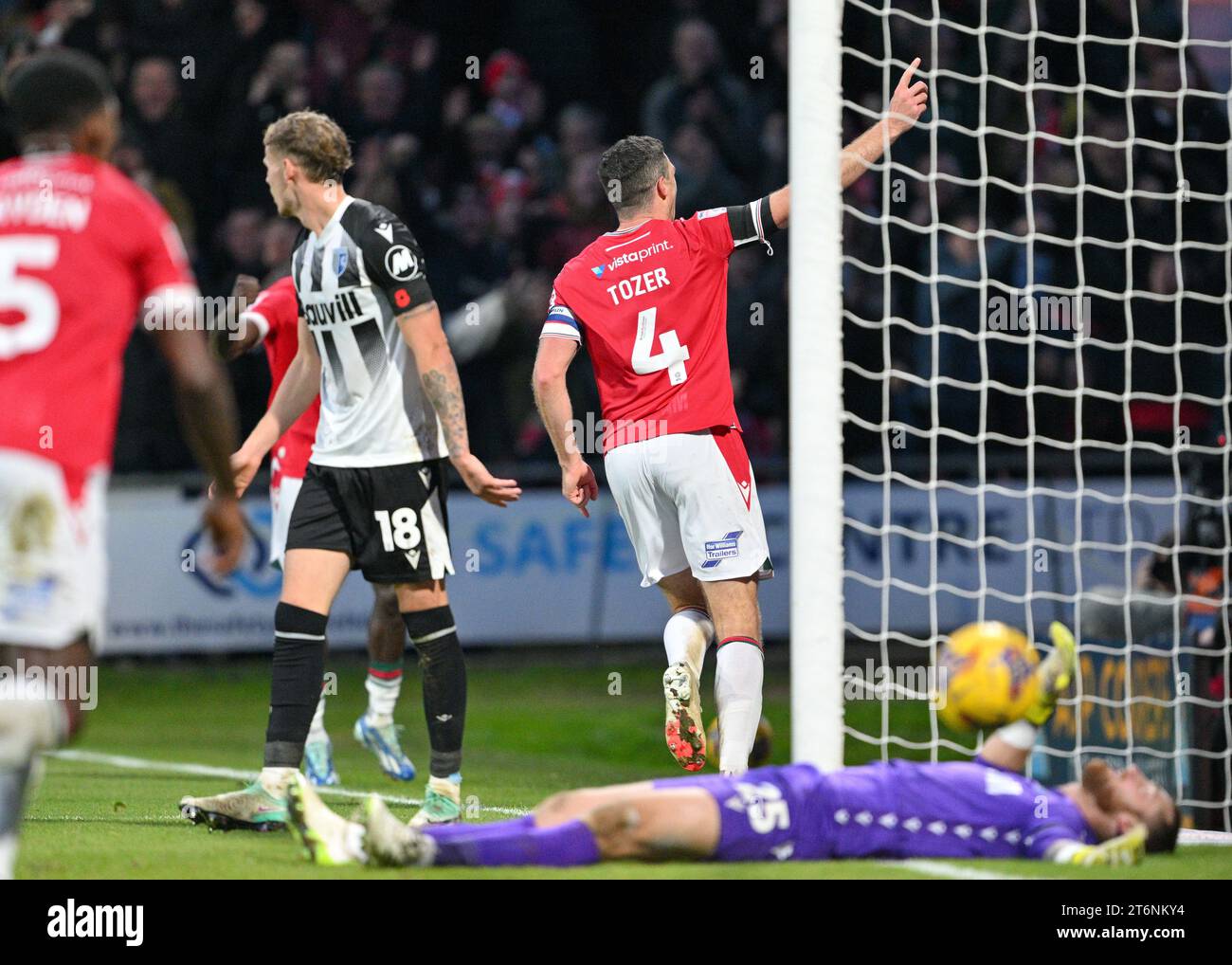 Ben Tozer 4# of Wrexham Association Football Club celebrates his goal, during the Sky Bet League 2 match Wrexham vs Gillingham at SToK Cae Ras, Wrexham, United Kingdom, 11th November 2023  (Photo by Cody Froggatt/News Images) Stock Photo