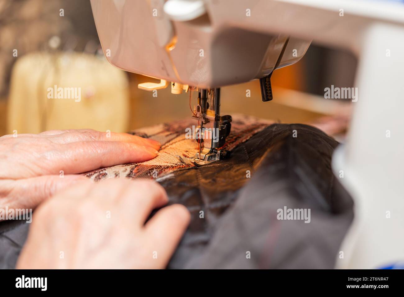 Female hands working modern sewing hi-res stock photography and images ...