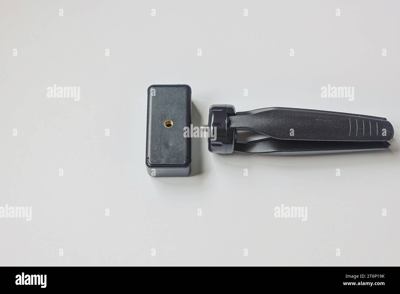 Mini tripod with cell phone holder technology concept Stock Photo