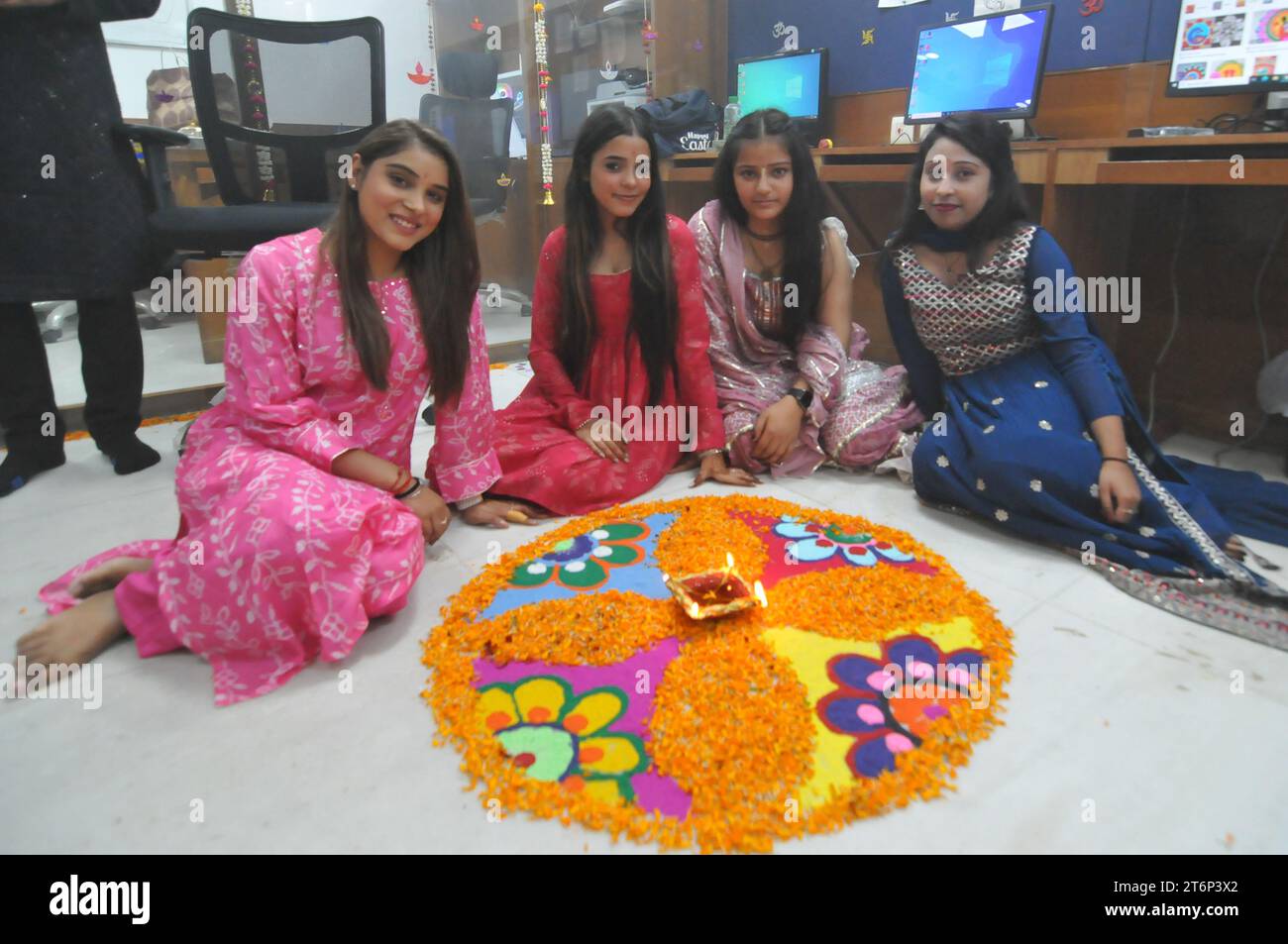 November 11, 2023, West Delhi, Delhi, India: Colorful Worship Pray ........In an office, on the eve of the Deepawali festival, on the occasion of Chhoti Deepawali, the owner with family member of the company and staff members who working there performed (Aarti Puja) or made a Rangoli and burn clay lamps (diyas) before that and prayed to God,in West Delhi on Saturday, 11 Nov 2023 (Credit Image: © Ravi Batra/ZUMA Press Wire) EDITORIAL USAGE ONLY! Not for Commercial USAGE! Stock Photo