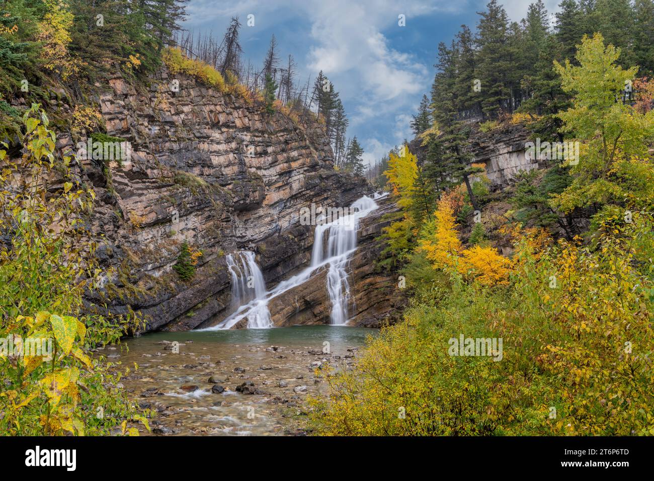 Cameron falls with fall foliage color in Waterton Lakes National Park, Alberta, Canada. Stock Photo