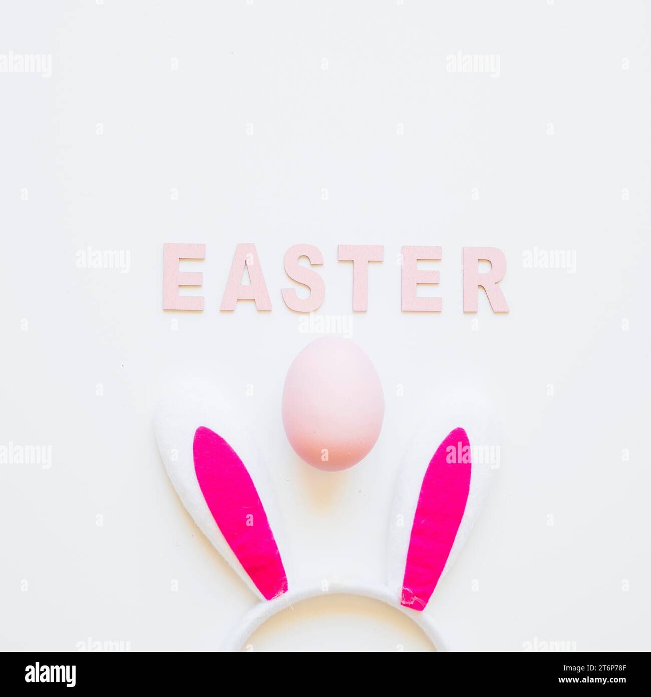 Easter word with bunny ears egg Stock Photo