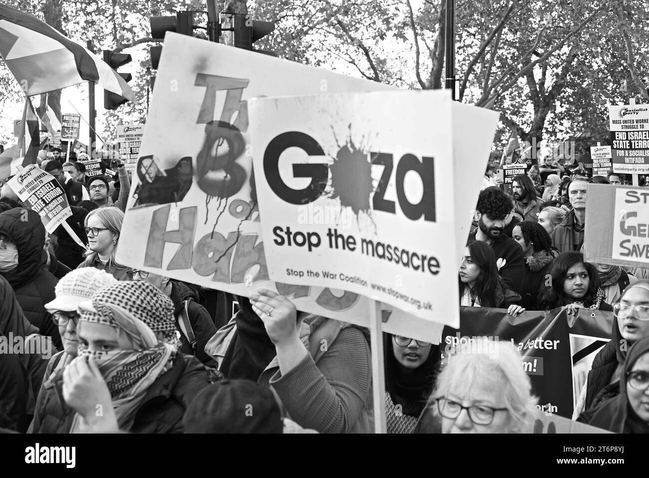 London's pro Palestine march protesters meet up in Hyde Park midday Saturday 11 November 2023 to march in demonstration against the bombs in GAZA that have killed 1000's of civilians in retaliation of the Hamas slaughter of at least 1200 innocent civilians .Police estimate around 300.000 protesters calling for a Gaza  ceasefire marched in central London today it's the biggest UK rally since the Israel-Gaza war began .More than 100 counter protesters have been arrested ,near the protest route .Officers faced aggression from some counter protesters including some far right groups ... Stock Photo