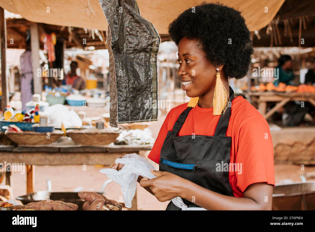 Side view happy african woman market Stock Photo - Alamy