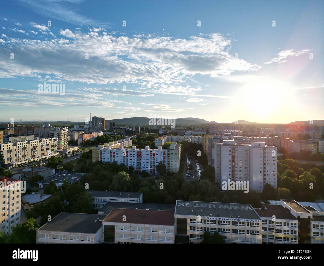 A stunning aerial view of a bustling city skyline at sunset Stock Photo ...