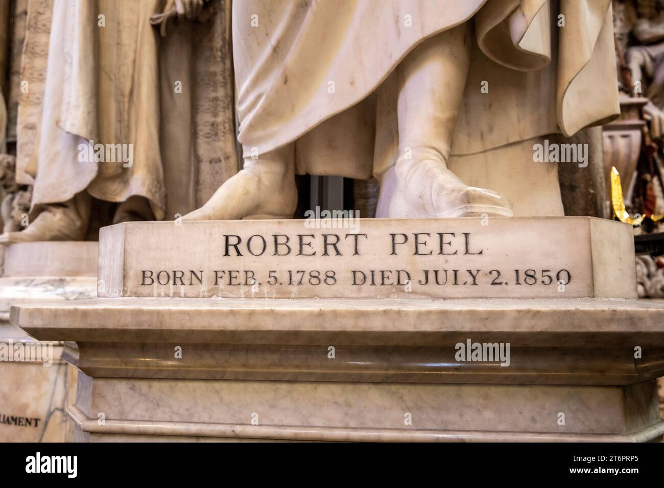 Statue of Robert Peel, close up feet, Westminster Abbey in London, UK,2023 Stock Photo