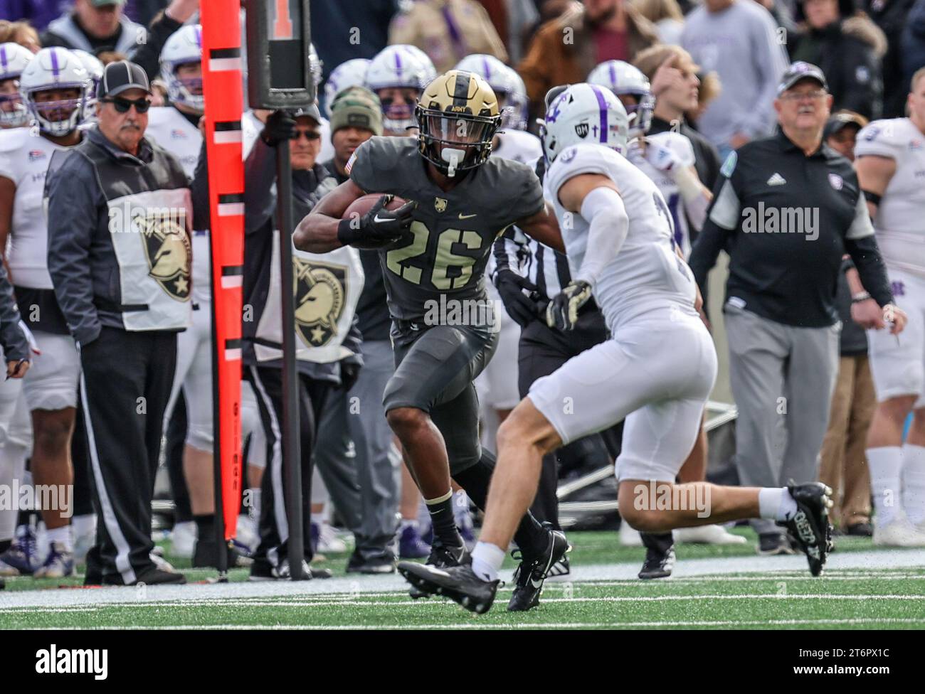 November 11, 2023: Army Black Knights running back Kanye Udoh (26) runs down the sideline during the NCAA football game between the Holy Cross Crusaders and the Army Black Knights at Michie Stadium in West Point, NY. Mike Langish/CSM Stock Photo