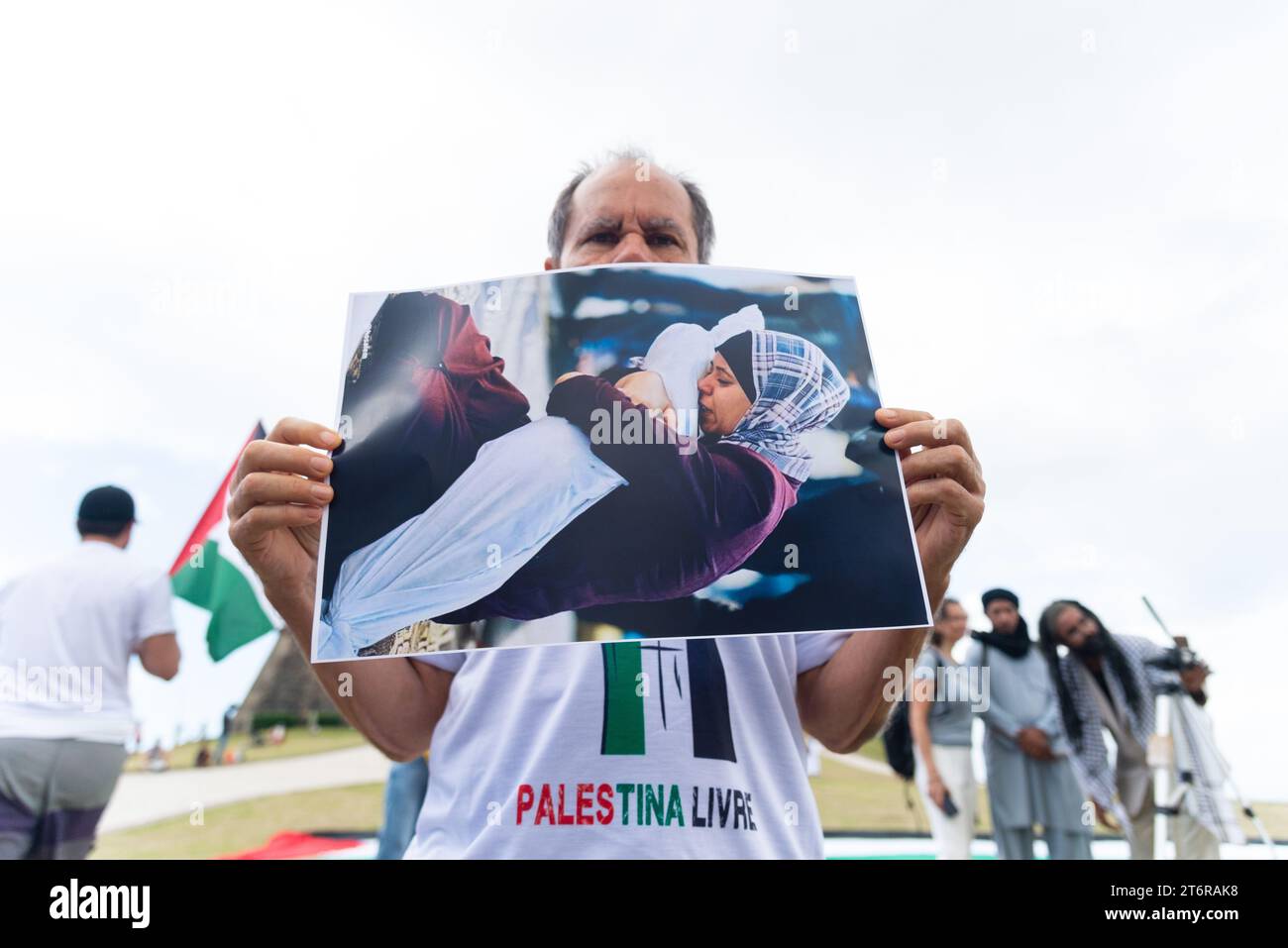 Salvador, Bahia, Brazil - November 11, 2023: Protester holds a photo of the war in Palestine during a protest in the city of Salvador, Bahia. Stock Photo