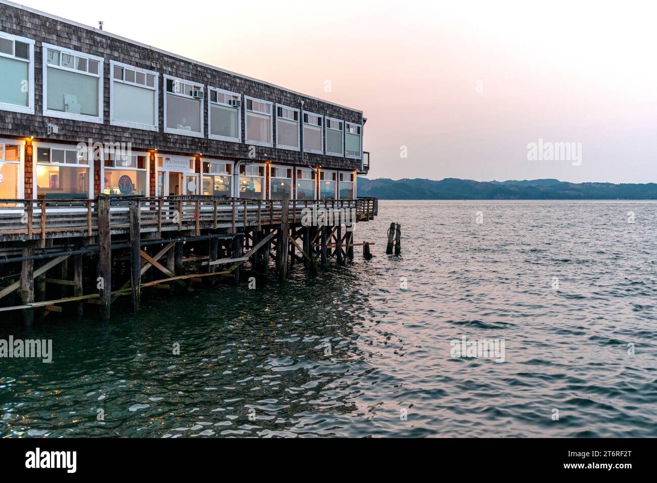 A mixeduse building of businesses and restaurants juts out into the