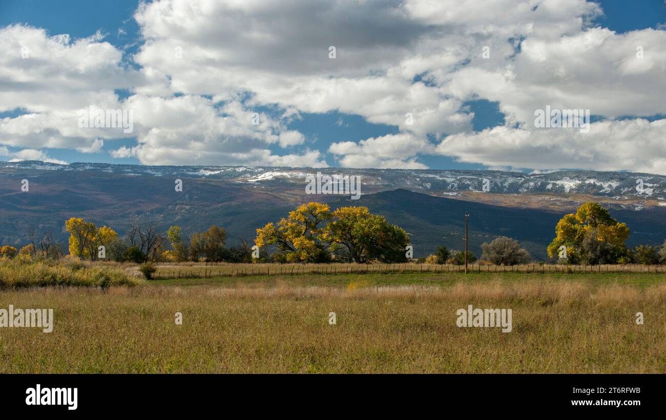 Colorado's Grand Mesa, the largest flat-topped mountain in the world, as seen from the town of Cedaredge. Stock Photo