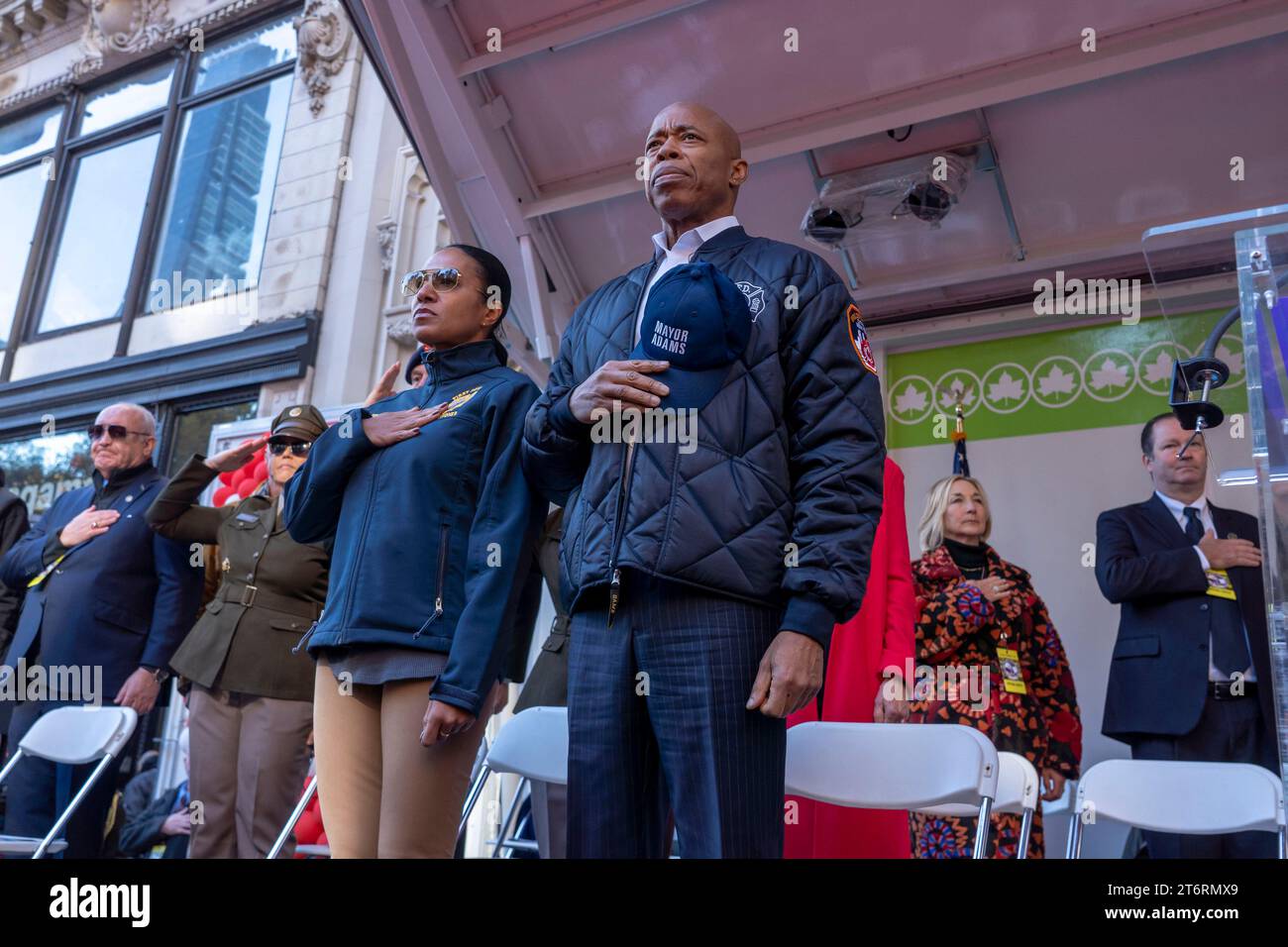 November 11, 2023, New York, New York, United States: (NEW) Veteran&#39;s Day Parade Held In New York City. November 11, 2023, New York, New York, USA: New York Mayor Eric Adams (R) and First Deputy Commissioner Tania Kinsella (L) attend the annual Veterans Day Parade on November 11, 2023 in New York City. Adams recently had his phone and iPad seized by the FBI as they investigate campaign funding in his administration. Hundreds of people lined 5th Avenue to watch the biggest Veterans Day parade in the United States. This years event included veterans, active soldiers, police officers, firefig Stock Photo