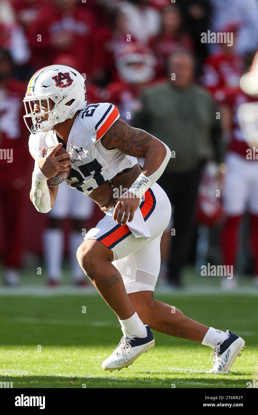 Hunter Richey November 11, 2023: Tigers running back Jarquez Hunter #27 brings the ...