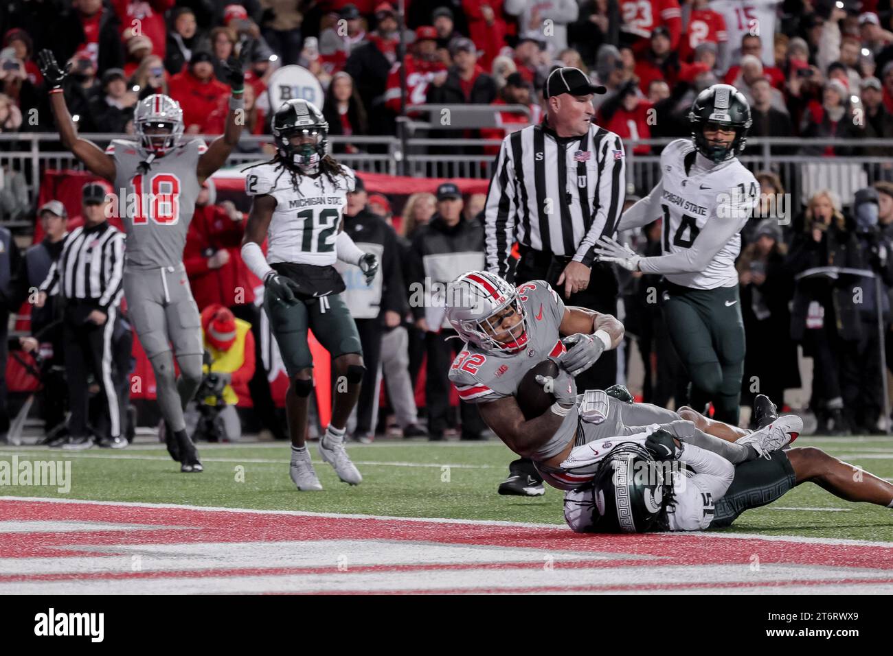 November 11, 2023, Columbus, Ohio, U.S: Ohio State Buckeyes running back TreVeyon Henderson (32) scores on a run as Ohio State Buckeyes wide receiver Marvin Harrison Jr. (18) celebrates the touchdown during the game between the Michigan State Spartans and the Ohio State Buckeyes at Ohio Stadium, Columbus, Ohio. (Credit Image: © Scott Stuart/ZUMA Press Wire) EDITORIAL USAGE ONLY! Not for Commercial USAGE! Stock Photo