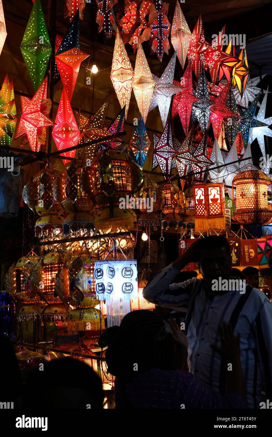Pune, India - November 10, 2023: Various colorful lanterns and earthen lamps are sold in Street Market before Diwali. Stock Photo