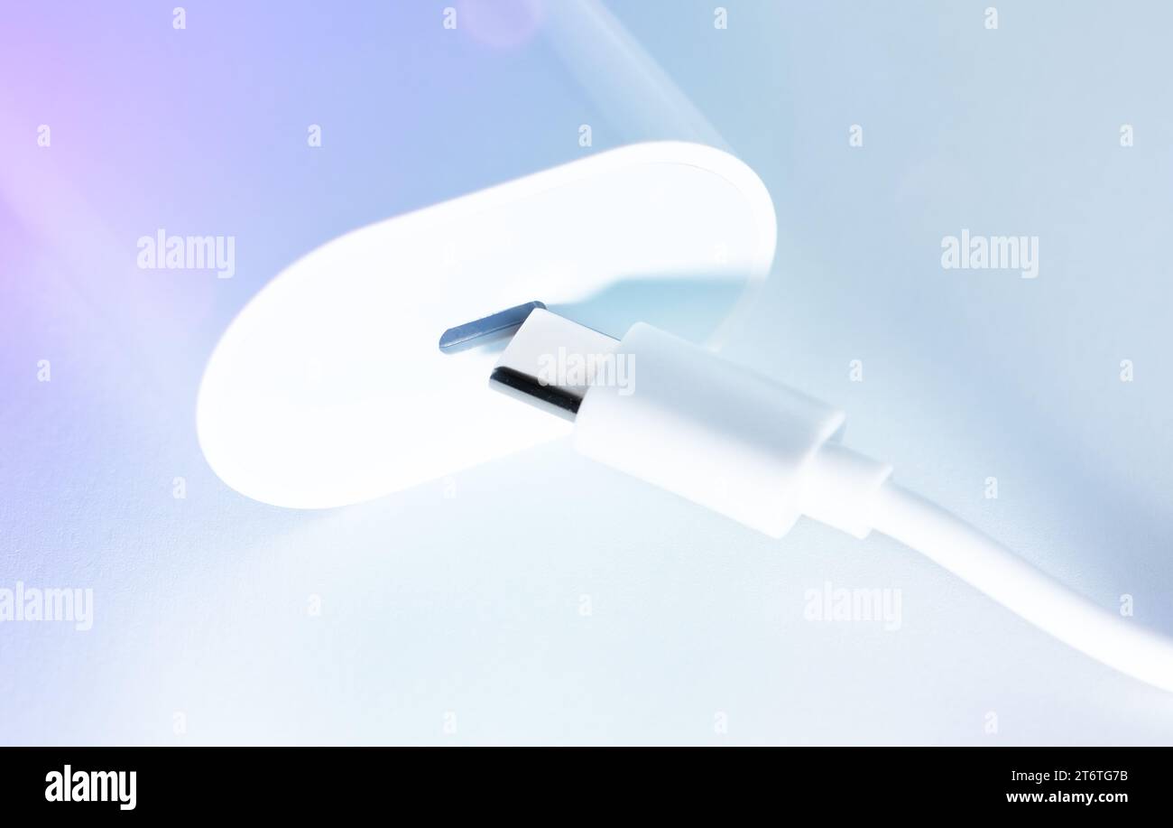 White smartphone charger with USB Type-C port Stock Photo