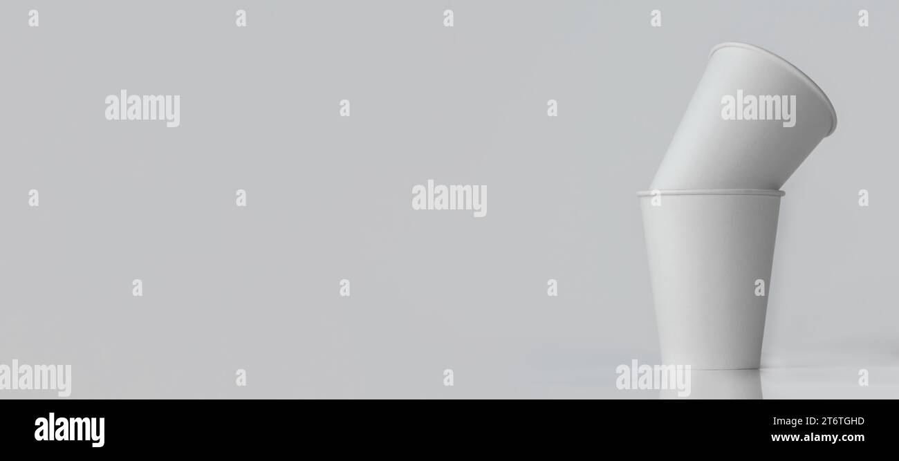 White Paper Cups on a white background. Stock Photo