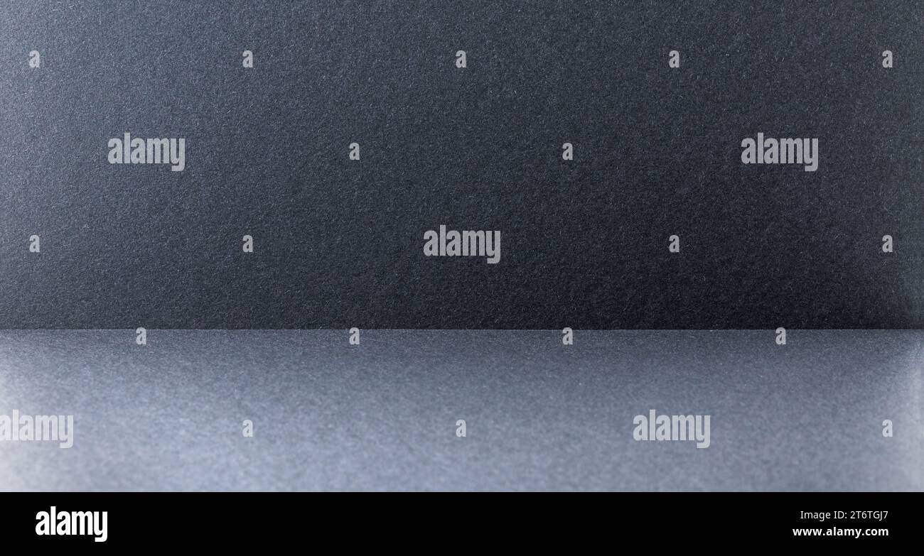 Dark gray and black abstract textured background. Stock Photo