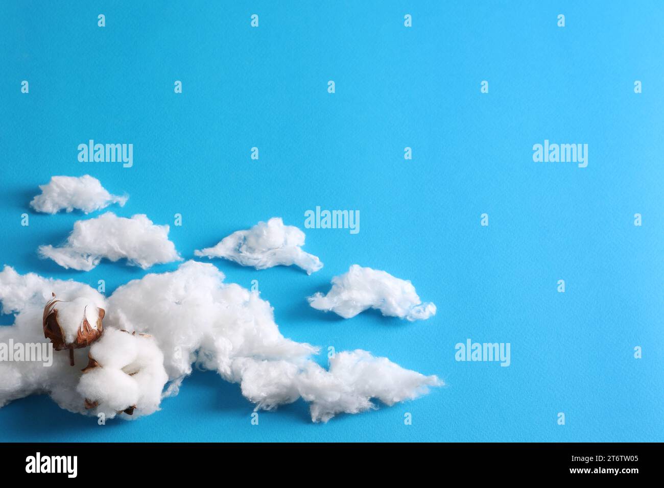 Cotton snow and cotton clouds in the sky. Cotton ball as a wool and  earsticks. White wall white chair white floor Stock Photo - Alamy