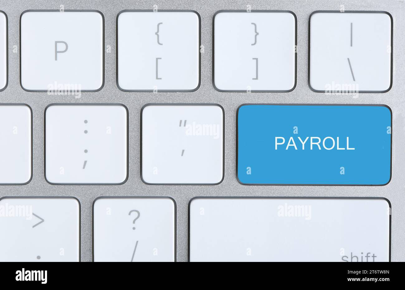 Light blue button with word Payroll on keyboard, top view Stock Photo
