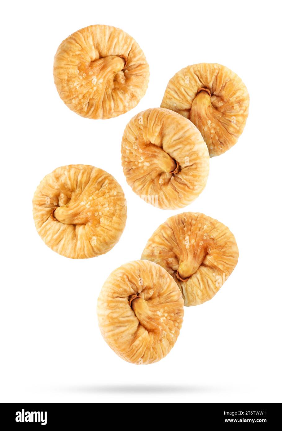 Many dried figs falling on white background Stock Photo
