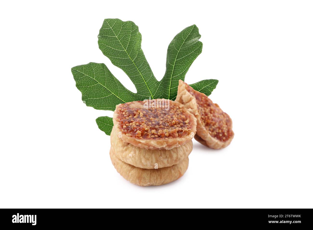 Dried figs and green leaf isolated on white Stock Photo