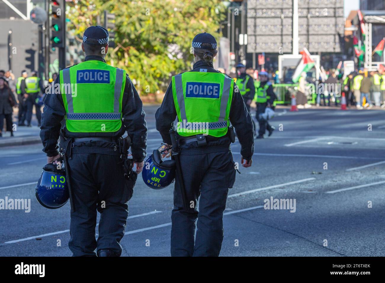 Back view Metropolitan Police officer on duty, at a protest demonstration in central London. Stock Photo