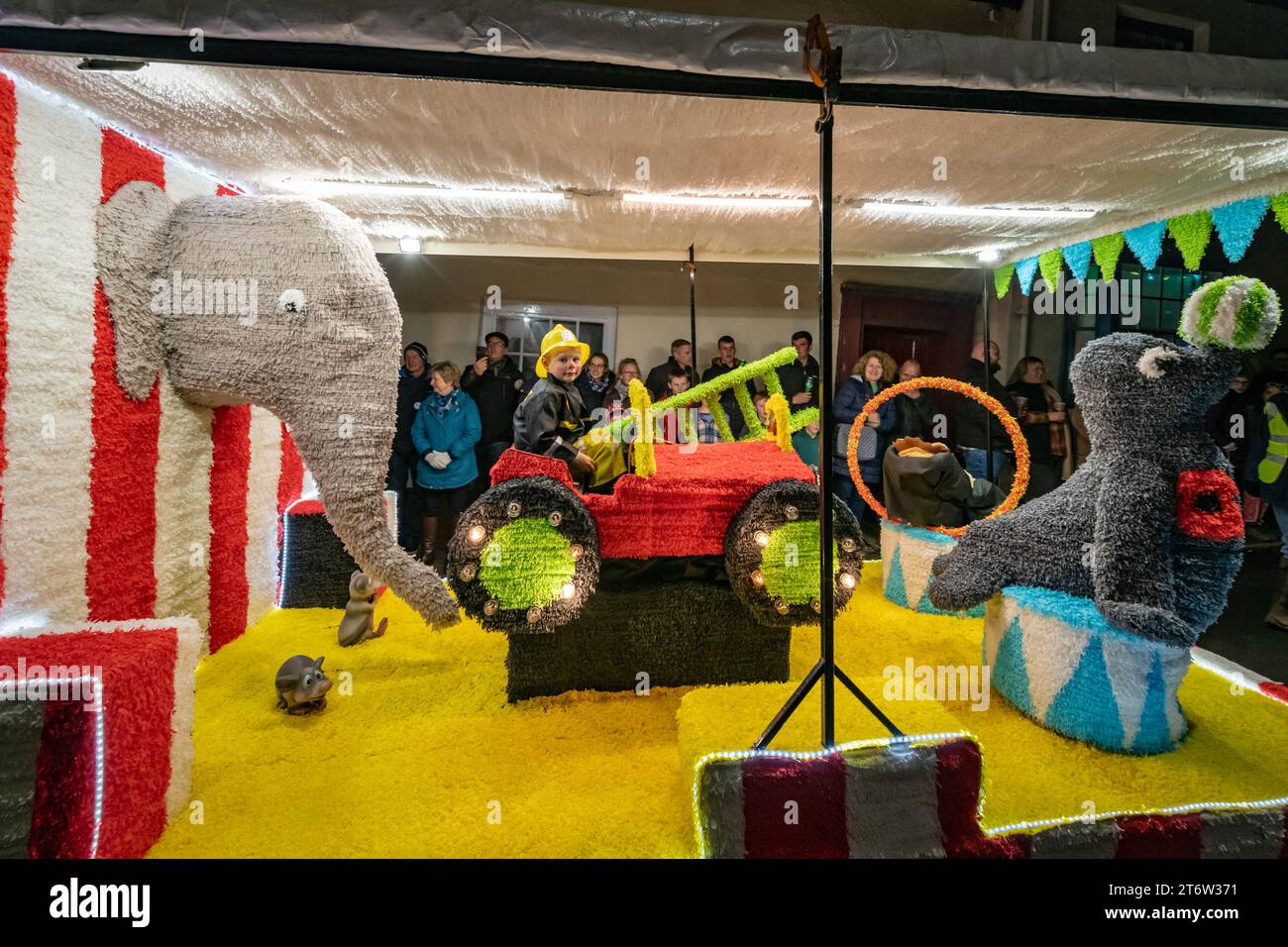 Hatherleigh, UK. 11 Novmeber 2023. Colourful parade floats in the