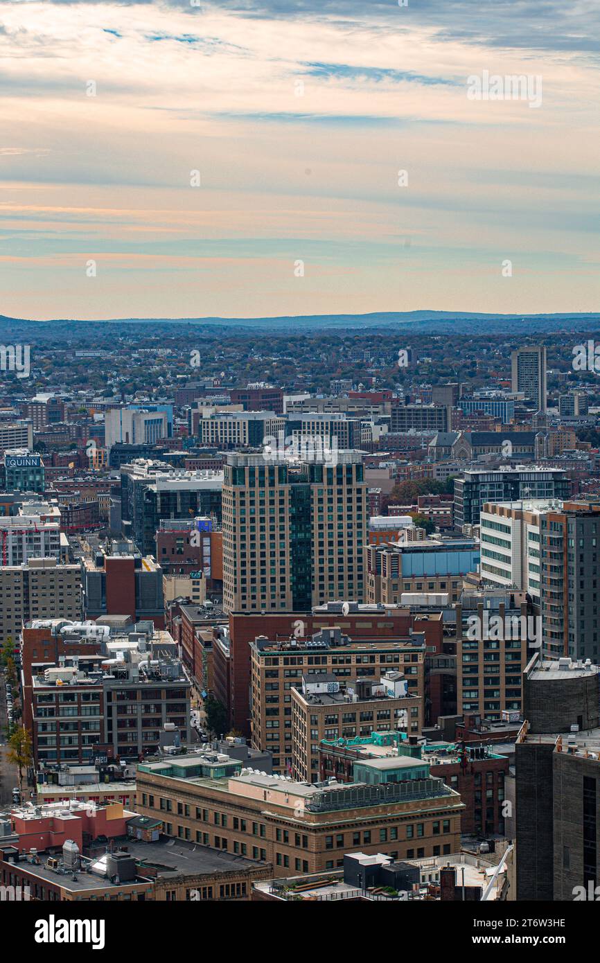 A bird's-eye view of a bustling city skyline featuring towering ...