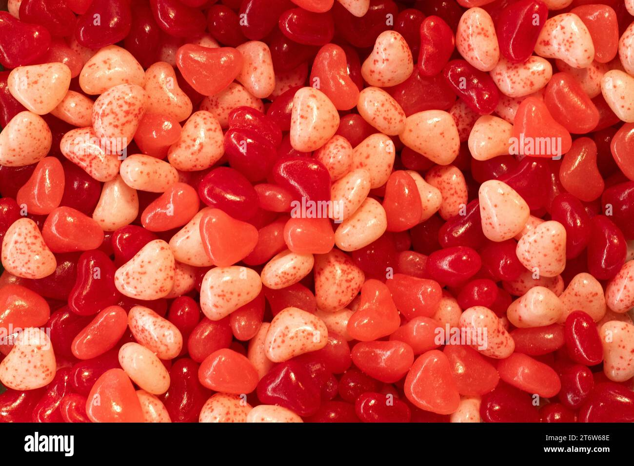 A bin of multi-colored red and pink candied hearts on sale in Jerusalem's Machane Yehuda market. Stock Photo