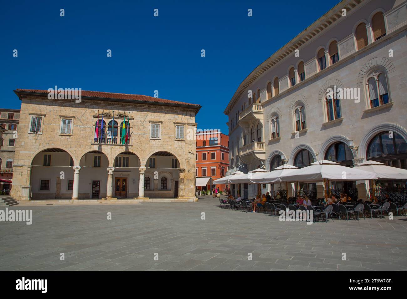 City Hall Building (Communal Palace) and Outdoor Restaurants, 1296, Forum Square, Old Town, Pula, Croatia Stock Photo