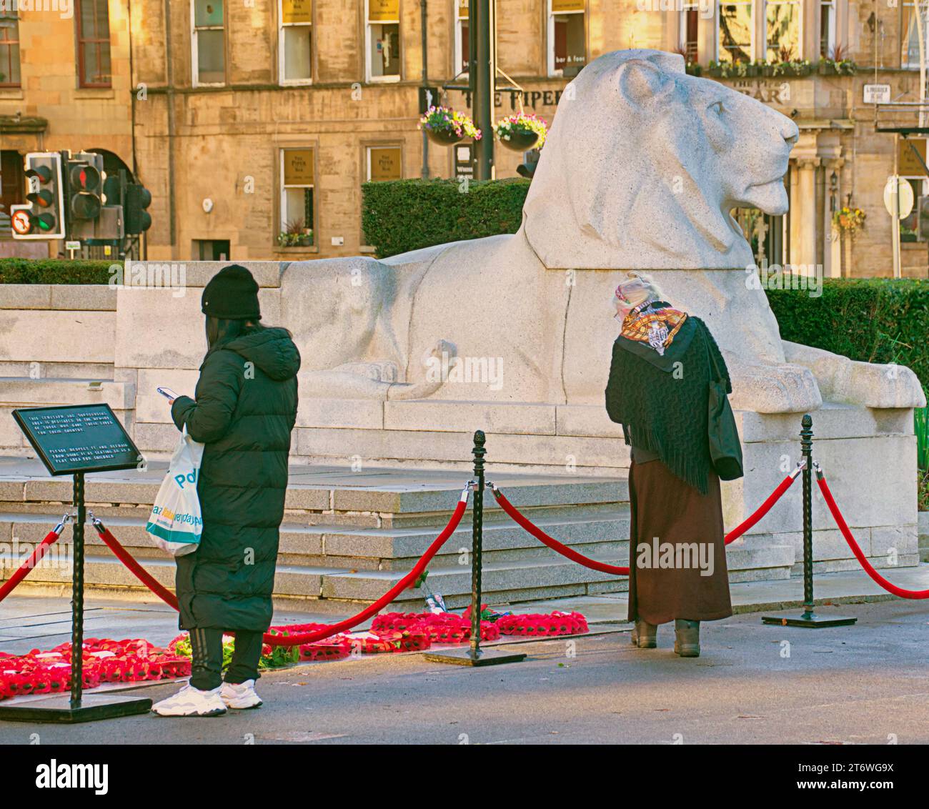 Glasgow, Scotland, UK. 12th November, 2023.Large police presence for remembrance Sunday in the city centre and the cenotaph with the remembrance garden in George square. Credit Gerard Ferry/Alamy Live News Stock Photo