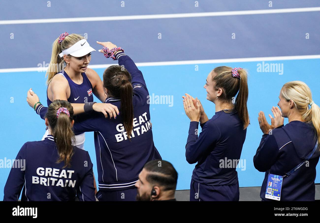 Great Britain's Katie Boulter celebrates with team mates after winning her match against Sweden’s Kajsa Rinaldo Persson (not pictured) during day two of the 2023 Billie Jean King Cup play-off between Great Britain and Sweden at the Copper Box Arena, London. Picture date: Sunday November 12, 2023. Stock Photo