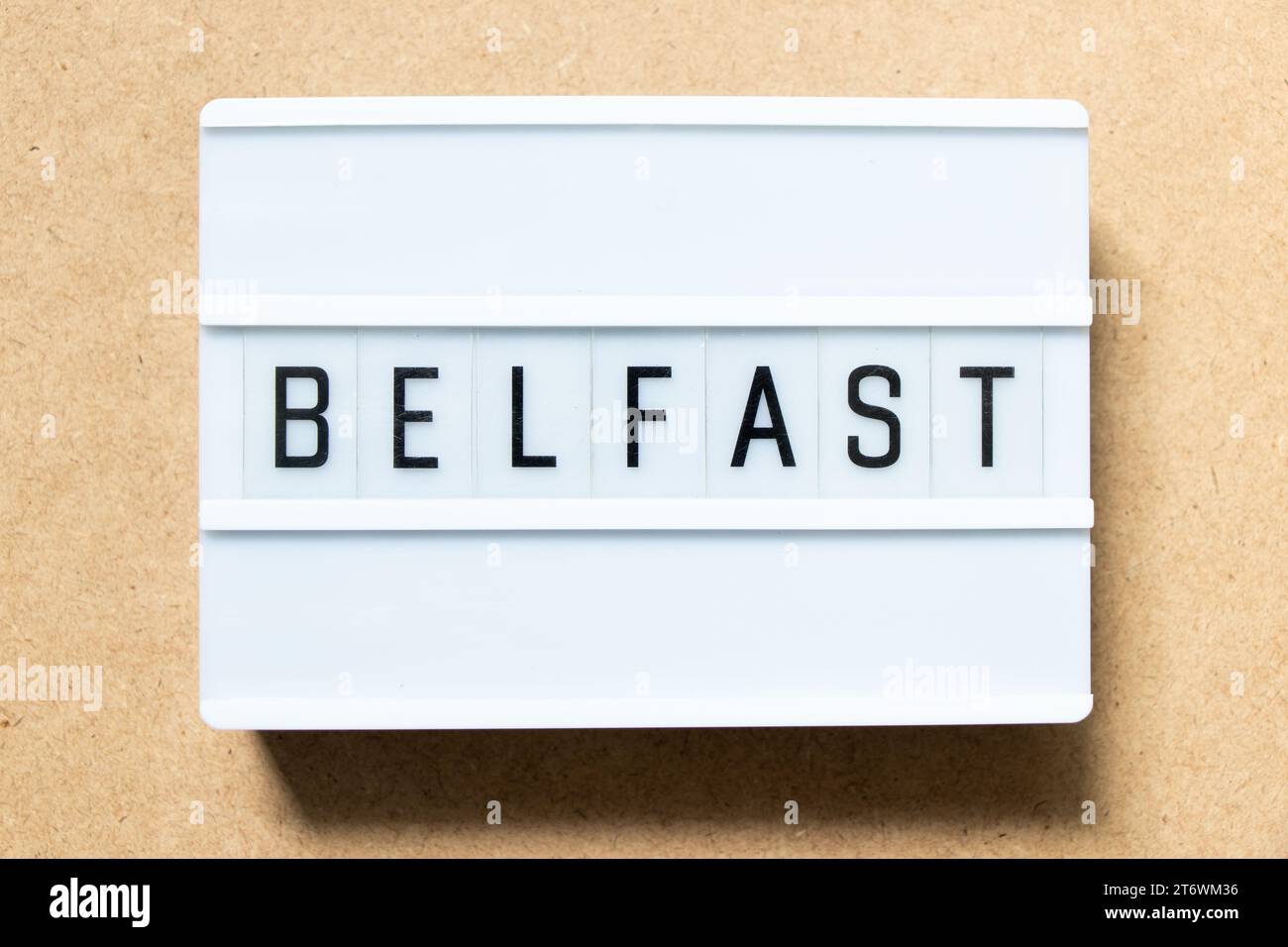 Lightbox with word belfast on wood background Stock Photo