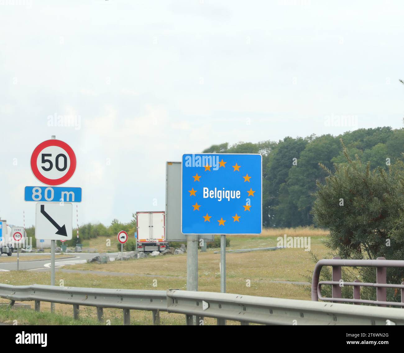 large road sign on the Belgian border between France and Belgium and ...
