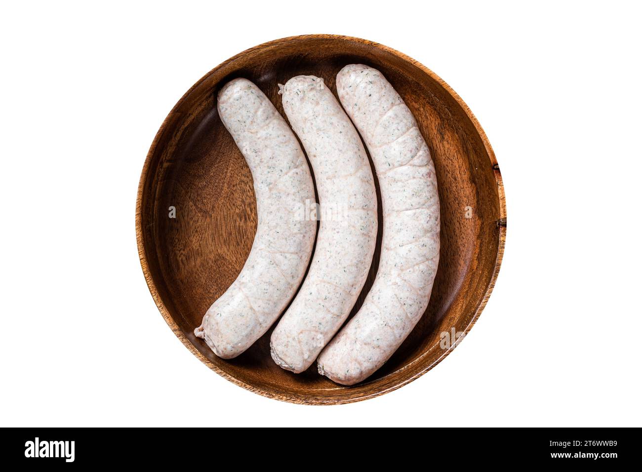 Raw Munich traditional white sausages in a wooden plate with herbs. Isolated, white background. Top view Stock Photo