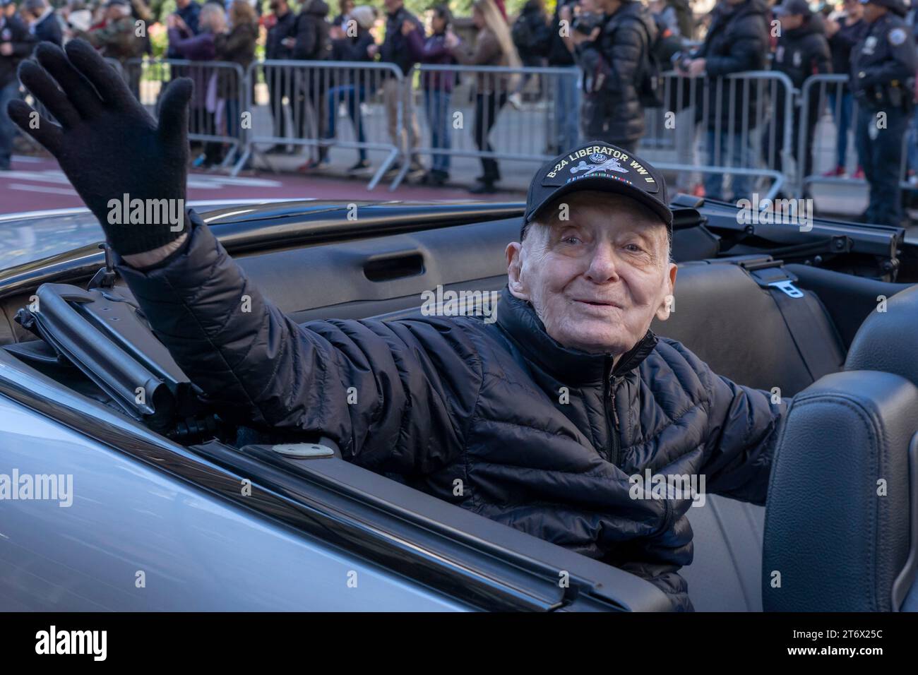 NEW YORK, NEW YORK - NOVEMBER 11: SSG Walter Rybarczik, 102 Years old WWII U.S. Army Air Corp B-24 Liberator aviator, participates in the annual Veterans Day Parade on November 11, 2023 in New York City. Hundreds of people lined 5th Avenue to watch the biggest Veterans Day parade in the United States. This years event included veterans, active soldiers, police officers, firefighters and dozens of school groups participating in the parade which honors the men and women who have served and sacrificed for the country. Stock Photo