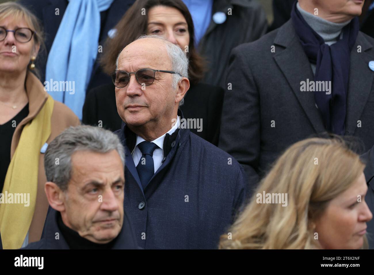 Former French President Nicolas Sarkozy (Front L) and former French prime minister and incumbent President of the Constitutional Council, Laurent Fabius pose for a photograph on the front steps of the Assemblee Nationale parliament building in Paris ahead of a demonstration against anti-Semitism in Paris, on November 12, 2023. Tens of thousands are expected to march Sunday in Paris against anti-Semitism amid bickering by political parties over who should take part and a surge in anti-Semitic incidents across France. Tensions have been rising in the French capital, home to large Jewish and Musl Stock Photo