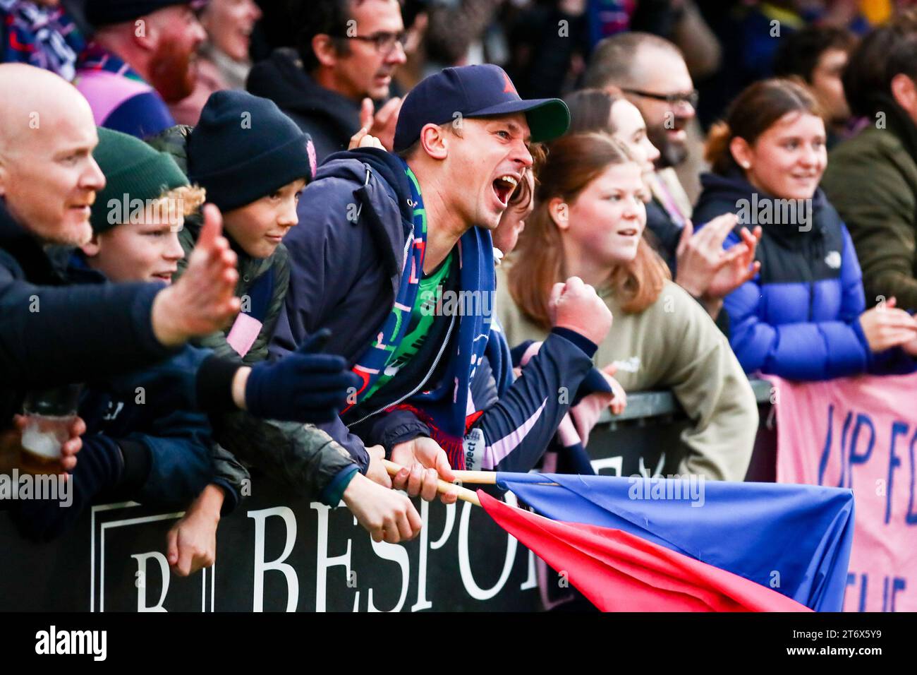London, England, November 12th 2023: Supporters of Dulwich Hamlet Women (‘The Pepper Army’) celebrate their team winning the Womens FA Cup first round proper game between Dulwich Hamlet and London Bees at Champion Hill in London, England.  (Liam Asman/SPP) Stock Photo