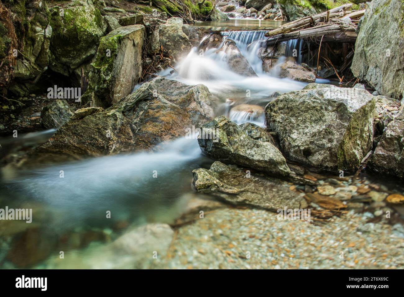 Scenic waterfall on happy creek, a small stream, peaceful and calm place, motion blur photo, north cascades national park, newhalem, washington, usa Stock Photo