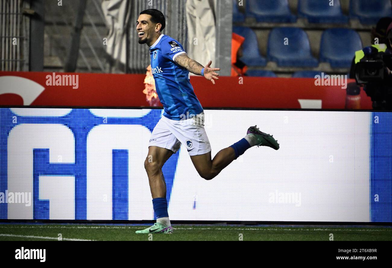 Genk's Daniel Munoz Mejia celebrates after scoring during a soccer
