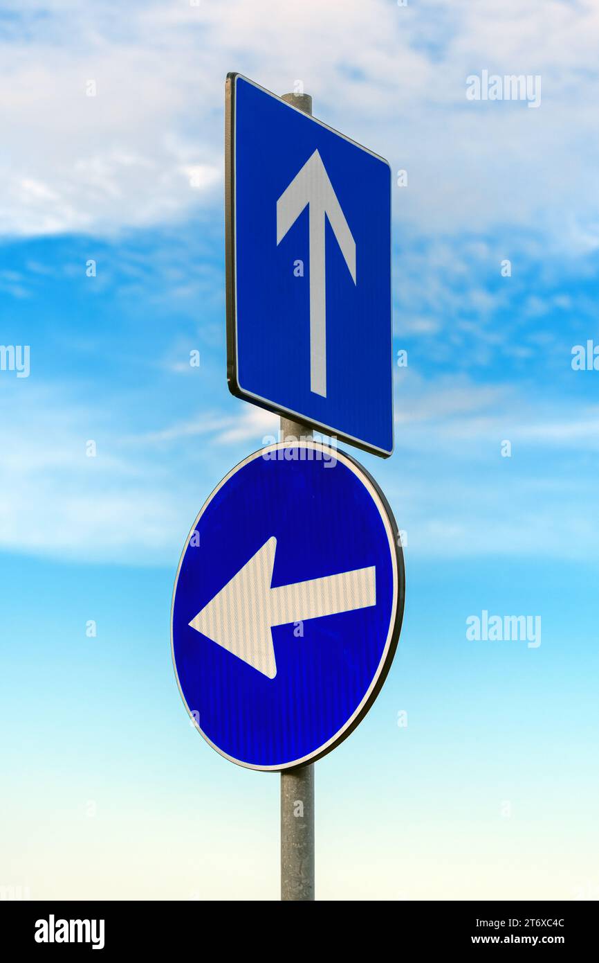 Mandatory direction sign, blue plate with white arrow symbol, selective