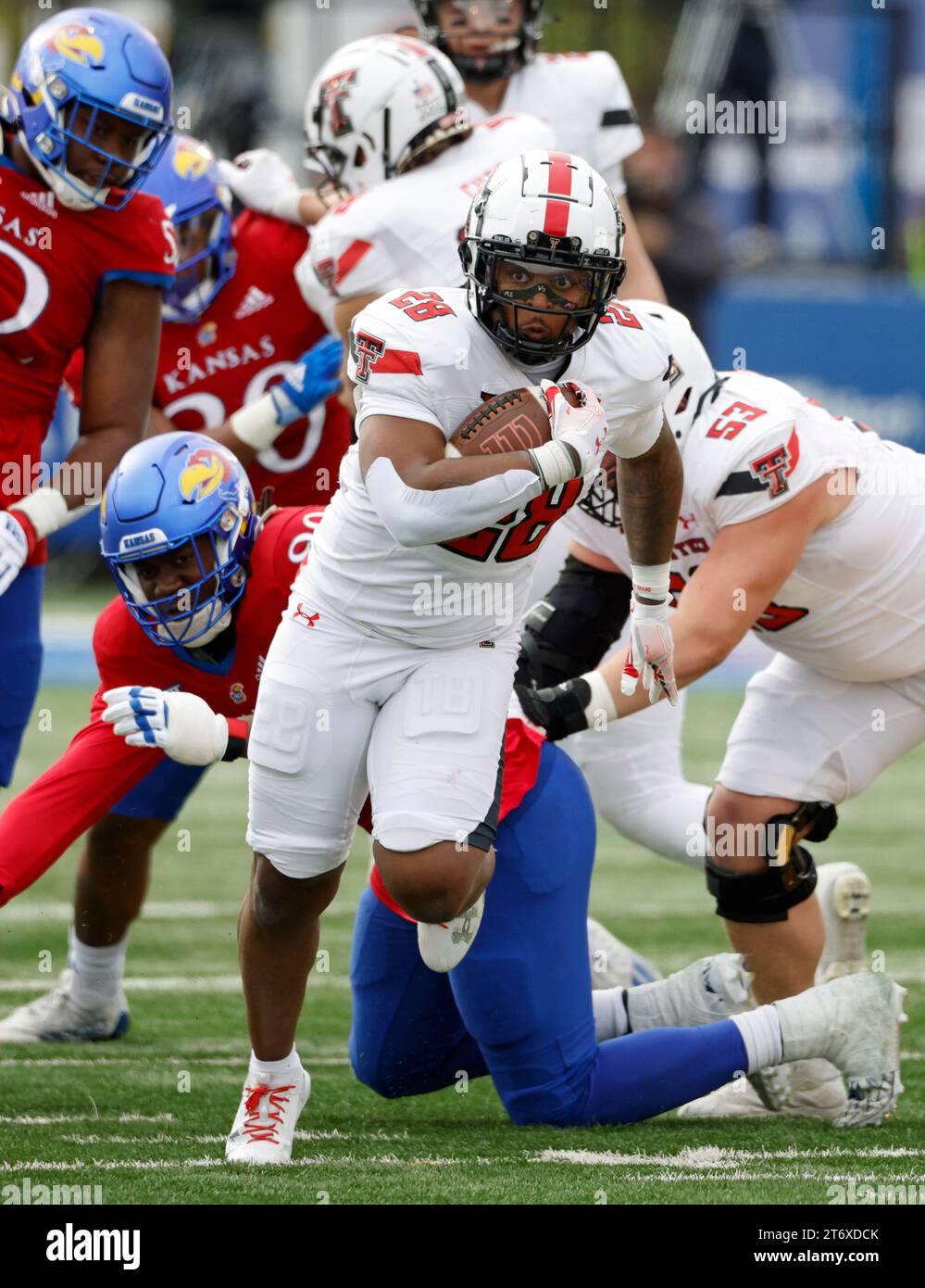 Texas Tech running back Tahj Brooks (28) rushes for a first down during