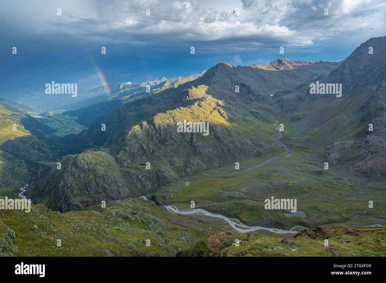 After the rain storm, mountains are illuminated by filtering sunlight ...