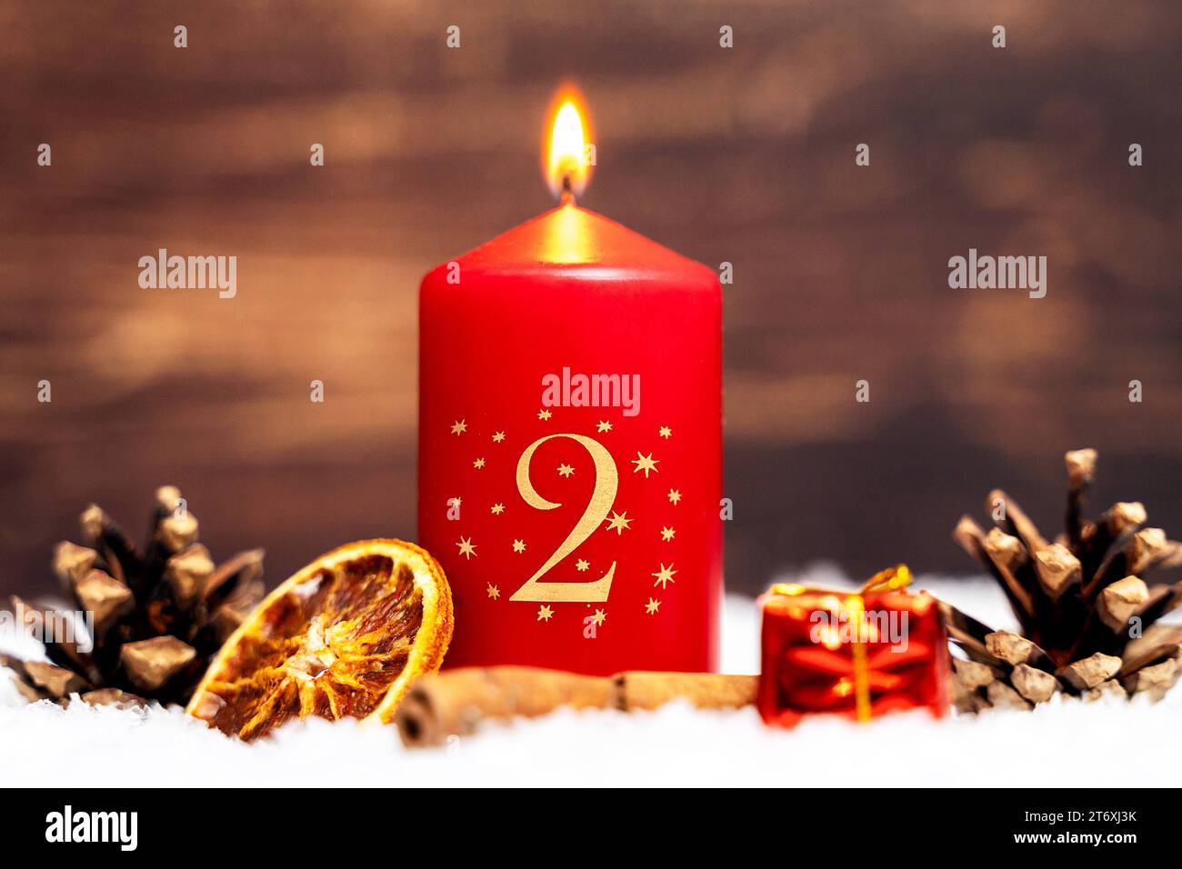 Bavaria, Germany - November 10, 2023: Candle with the number 2 burns on the second Sunday of Advent *** Kerze mit der Zahl 2 brennt zum zweiten Adventssonntag Stock Photo