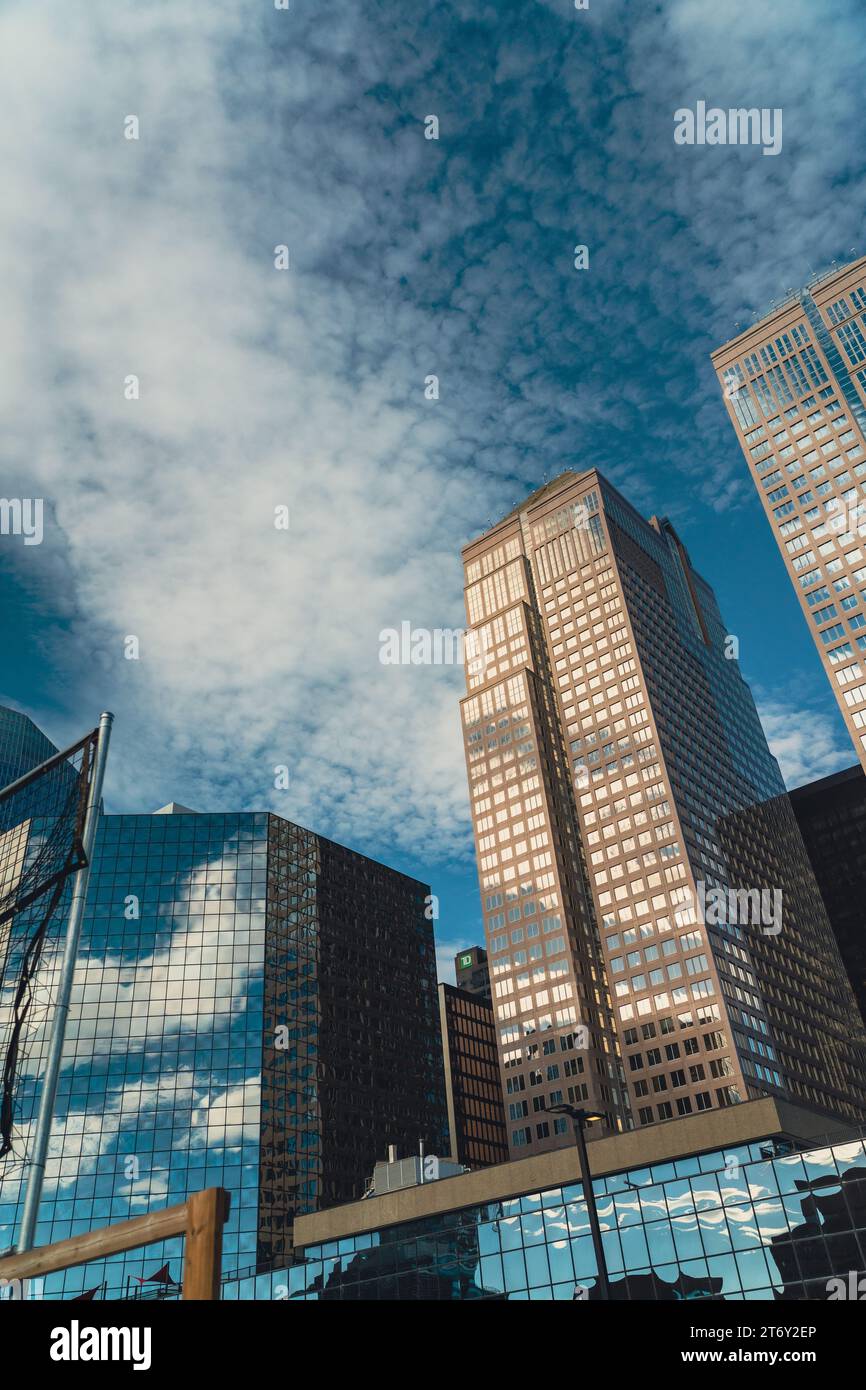 An aerial view of a city skyline featuring modern skyscrapers under the ...