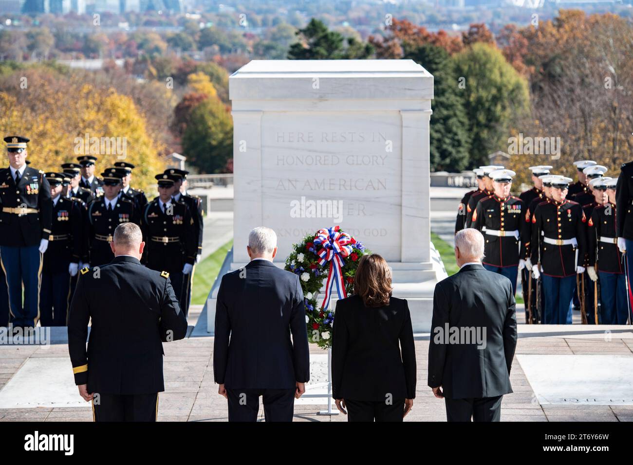 Arlington, United States. 11 November, 2023. Left to right: National Capital Region Commanding General Maj. Gen. Trevor Bredenkamp, Secretary of Veterans Affairs Denis McDonough, Vice President Kamala Harris, and U.S President Joe Biden, stand for a moment of silence at the Tomb of the Unknown Soldier during the 70th National Veterans Day Observance at Arlington National Cemetery, November 11, 2023 in Arlington, Virginia.  Credit: Elizabeth Fraser/US Army Photo/Alamy Live News Stock Photo