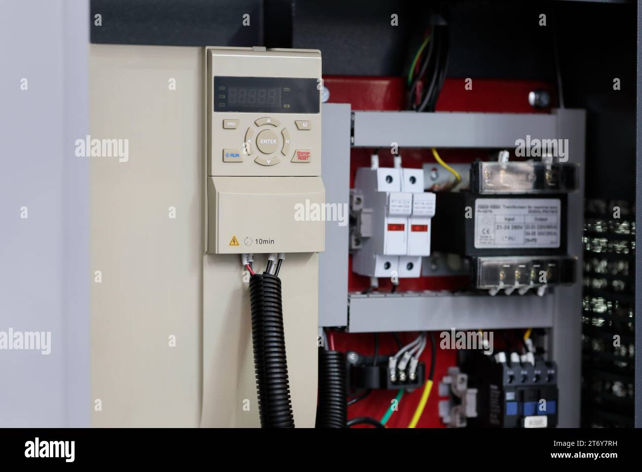 Electrical enclosure for modern industrial machine. Selective focus. Stock Photo