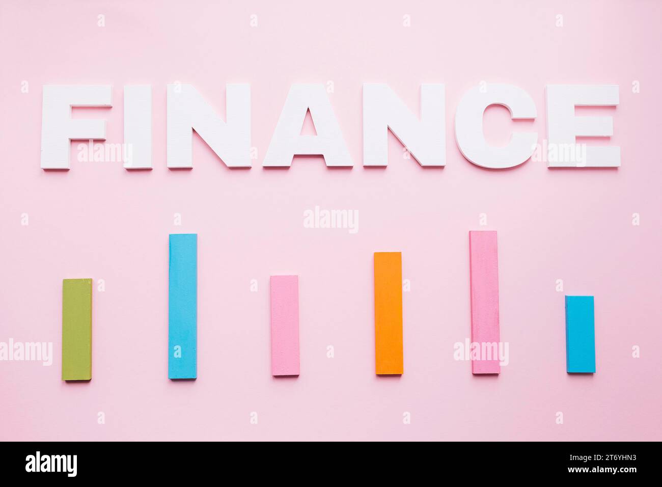 White finance text colored bar graph pink background Stock Photo - Alamy