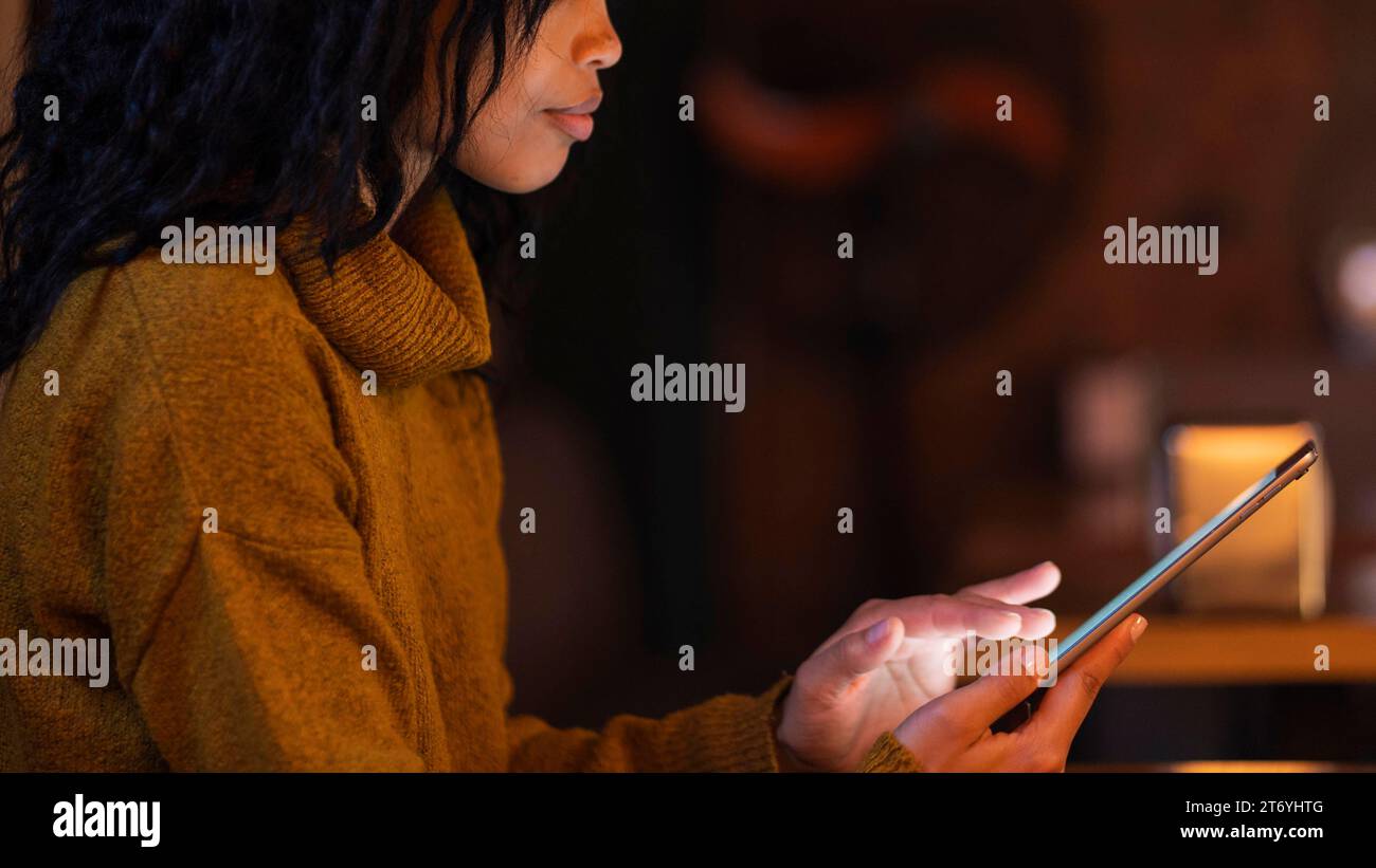 Woman using tablet coffee shop Stock Photo